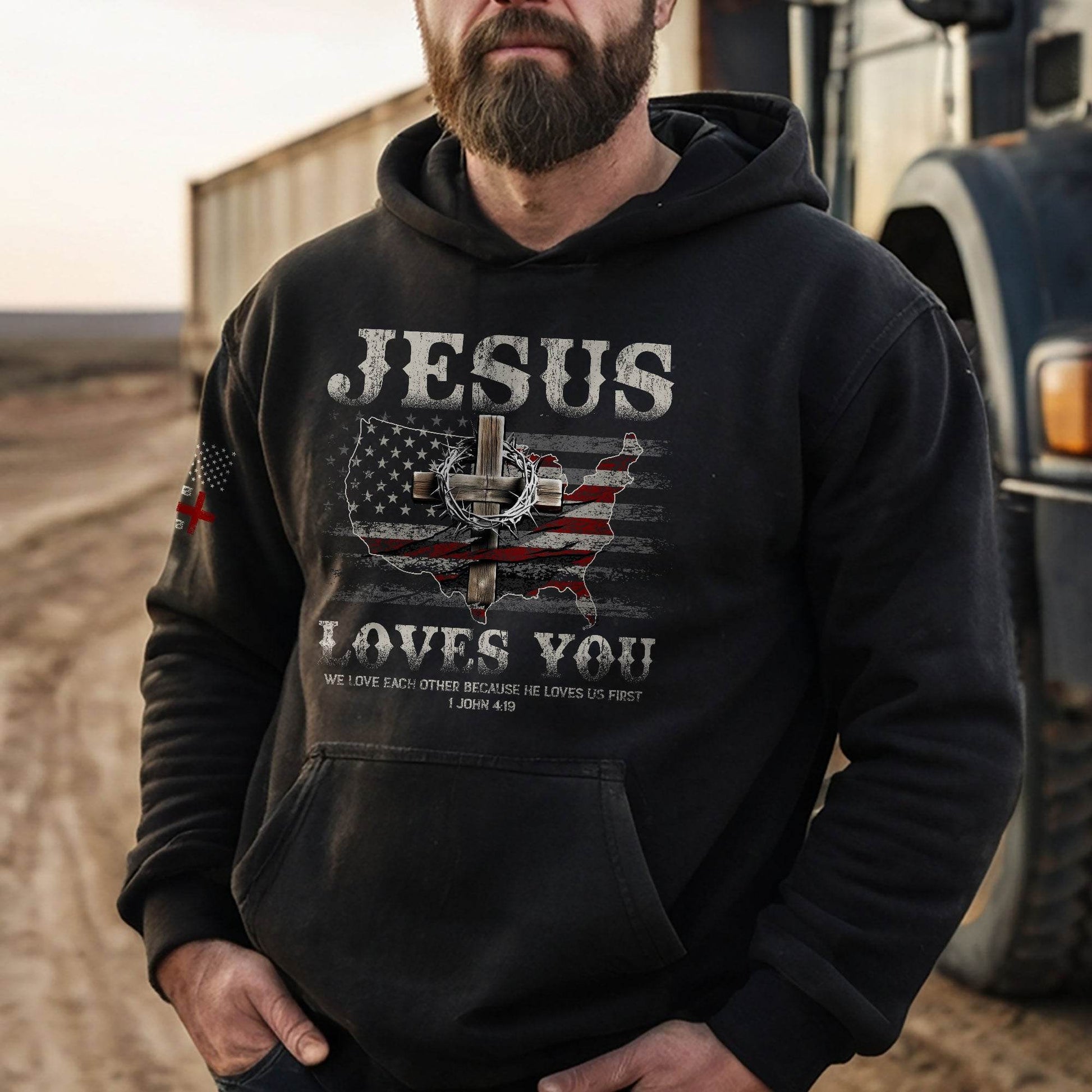 Jesus Loves You Hoodie – 1 John 4:19 Cross & USA Flag Design - Rust Field Wear