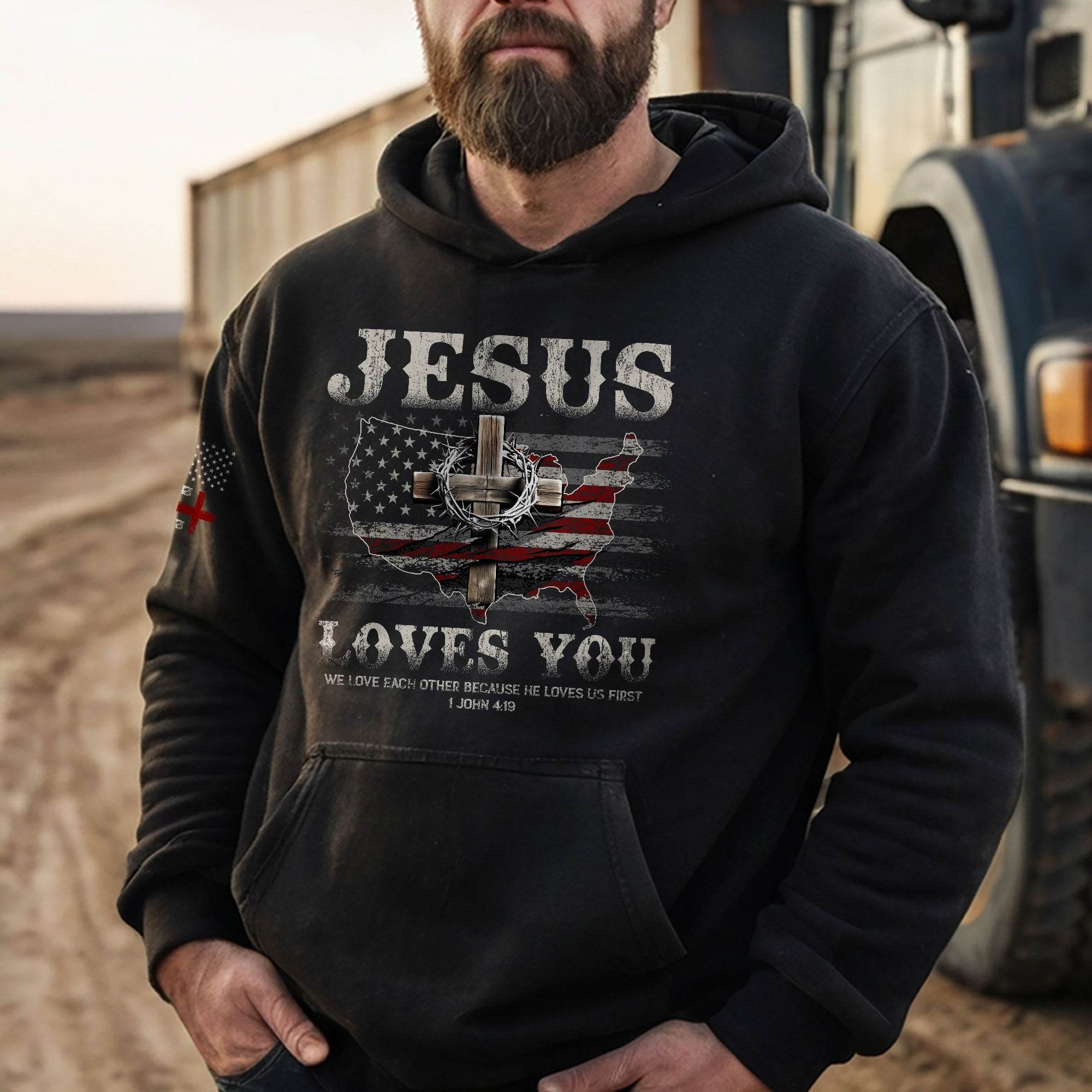 Jesus Loves You Hoodie – 1 John 4:19 Cross & USA Flag Design - Rust Field Wear