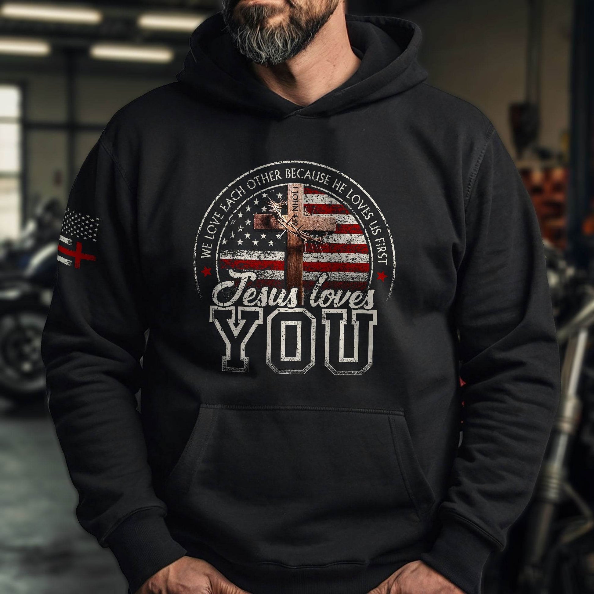 Jesus Loves You Hoodie – 1 John 4:19 Cross & Flag Graphic - Rust Field Wear