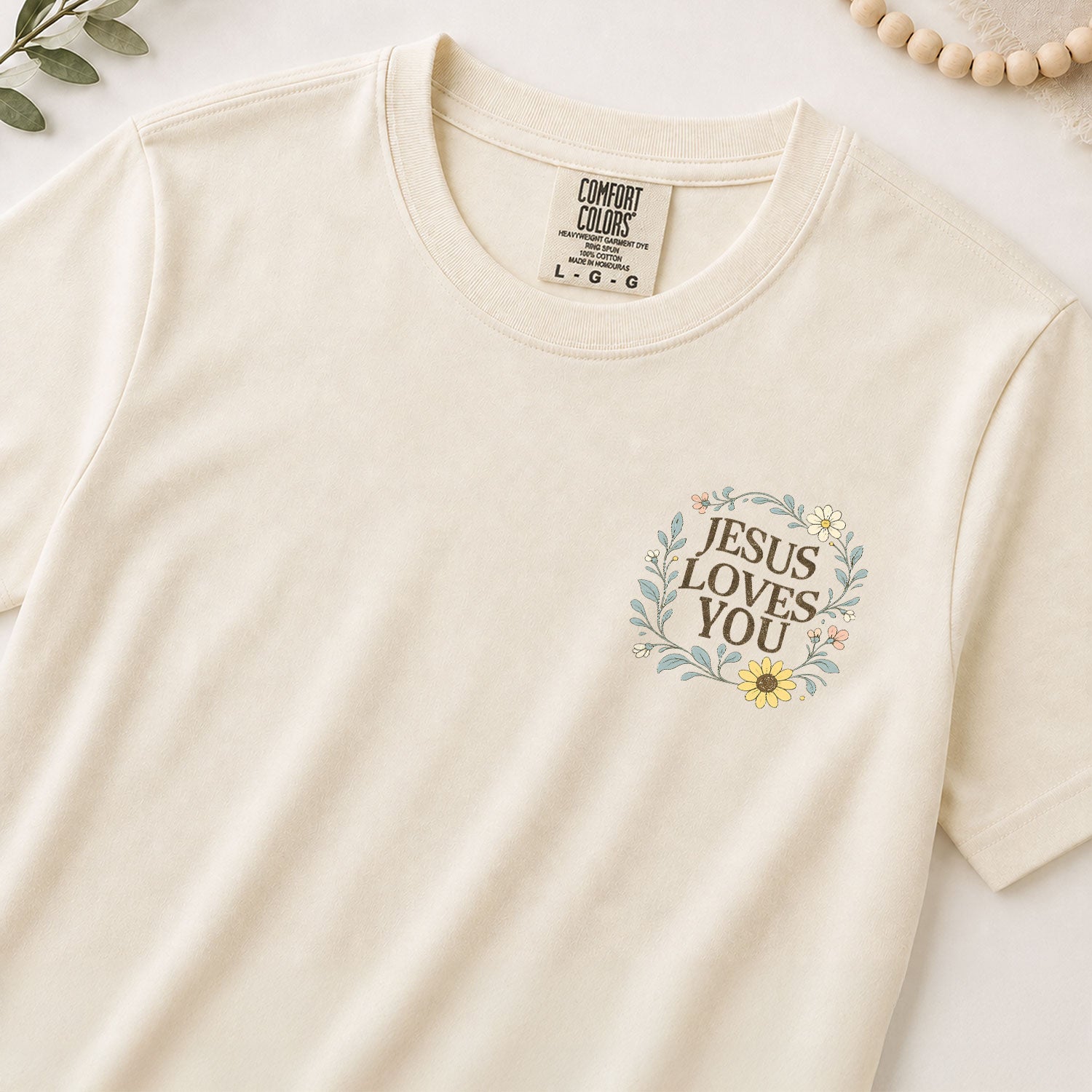 Jesus Loves You Cross Sunflower 1 John 4:19 Christian Graphic Tee For Women Apparel