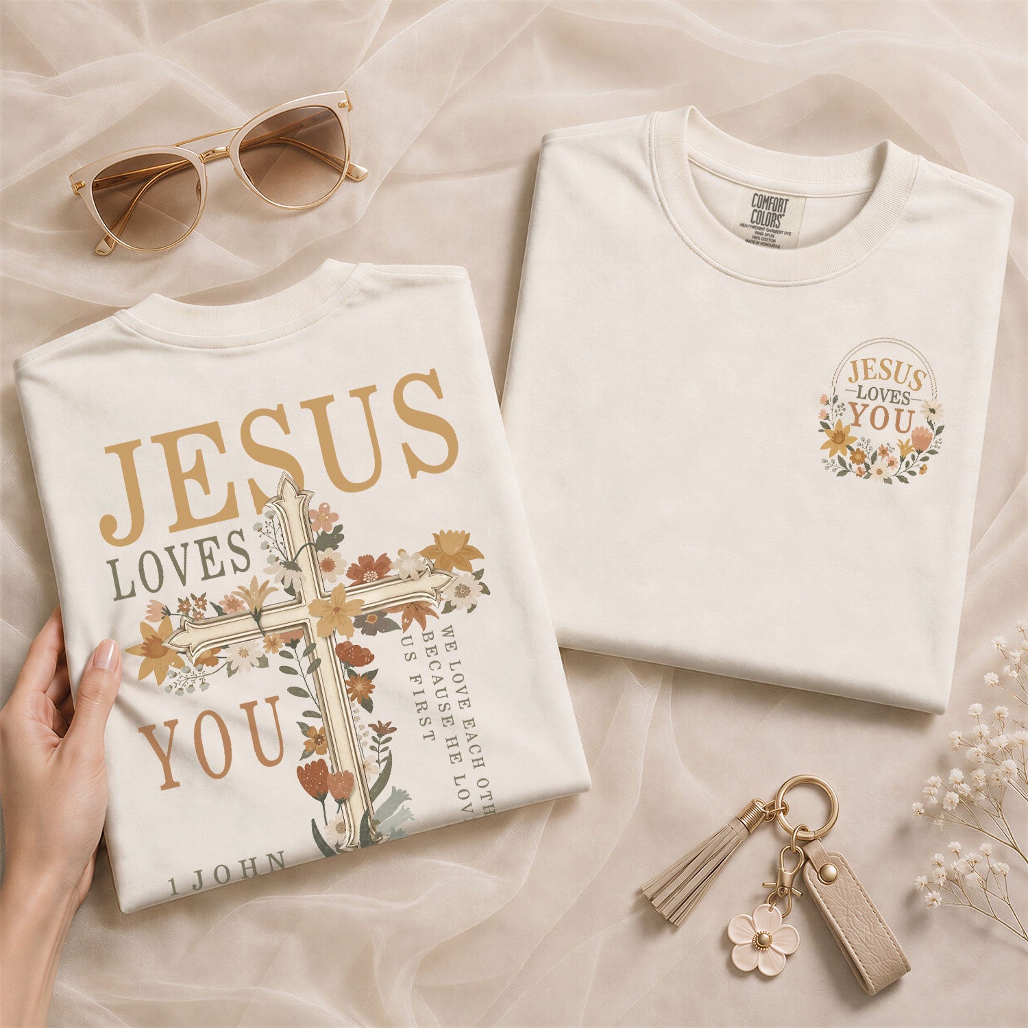 Jesus Loves You Pink Floral Cross 1 John 4:19 Christian Graphic Tee For Women Apparel
