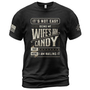 Graphic T-Shirt Its Not Easy Being My Wifes Arm Candy But Here I Am Nailing It Vintage