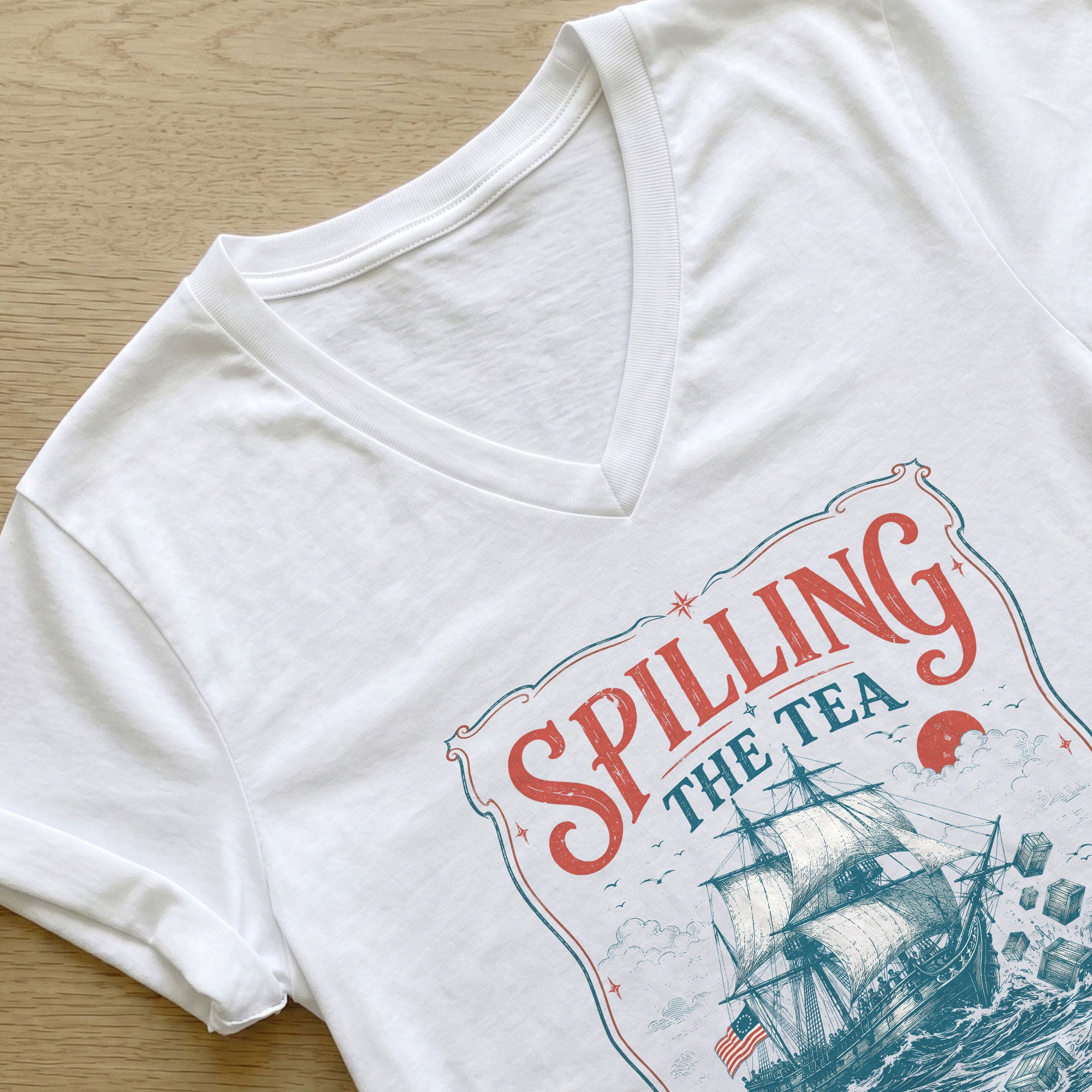 Women Spilling The Tea Since 1773 V-Neck Shirt Patriotic Vintage Sailing Ship Tee