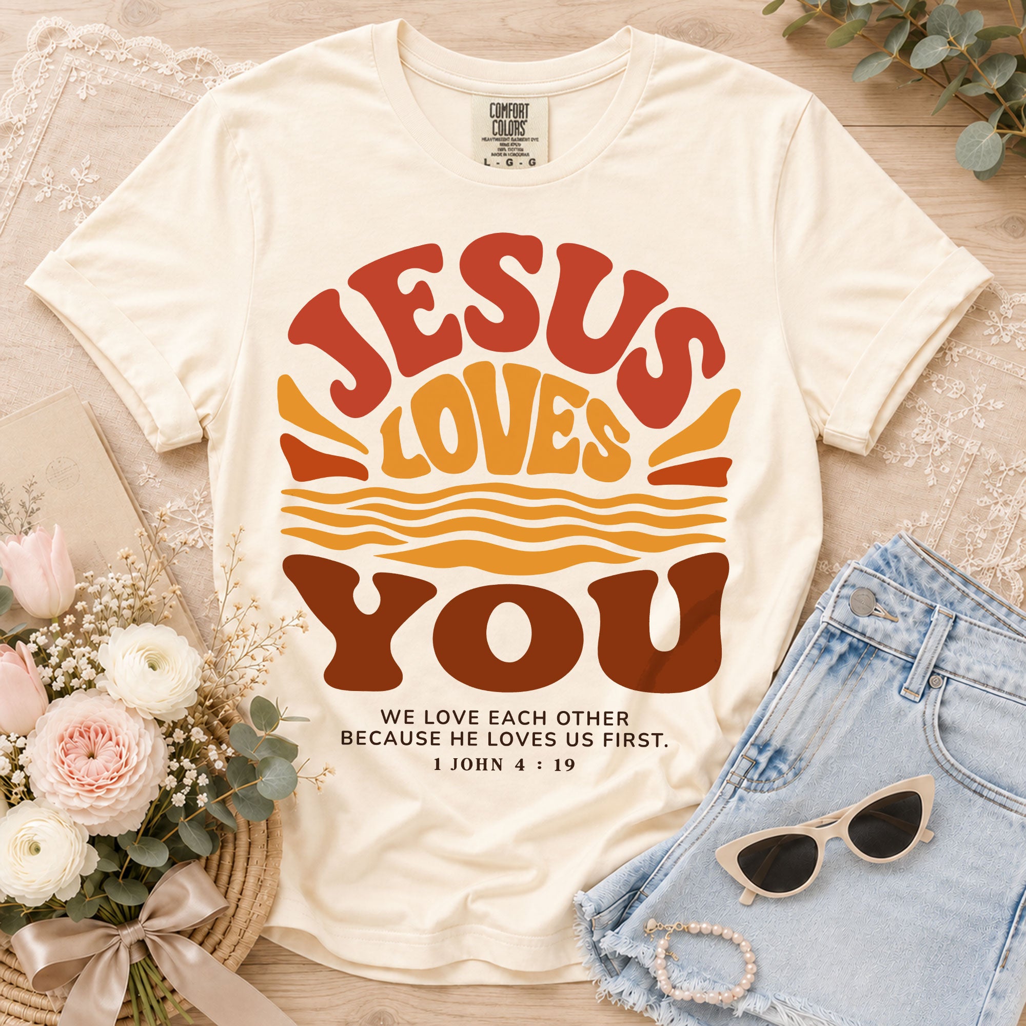 Jesus Loves You Shirt Sunset Wavy 70s Christian Bible Verse 1 John 4 19 Graphic Tee