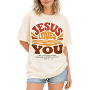 Jesus Loves You Shirt Sunset Wavy 70s Christian Bible Verse 1 John 4 19 Graphic Tee