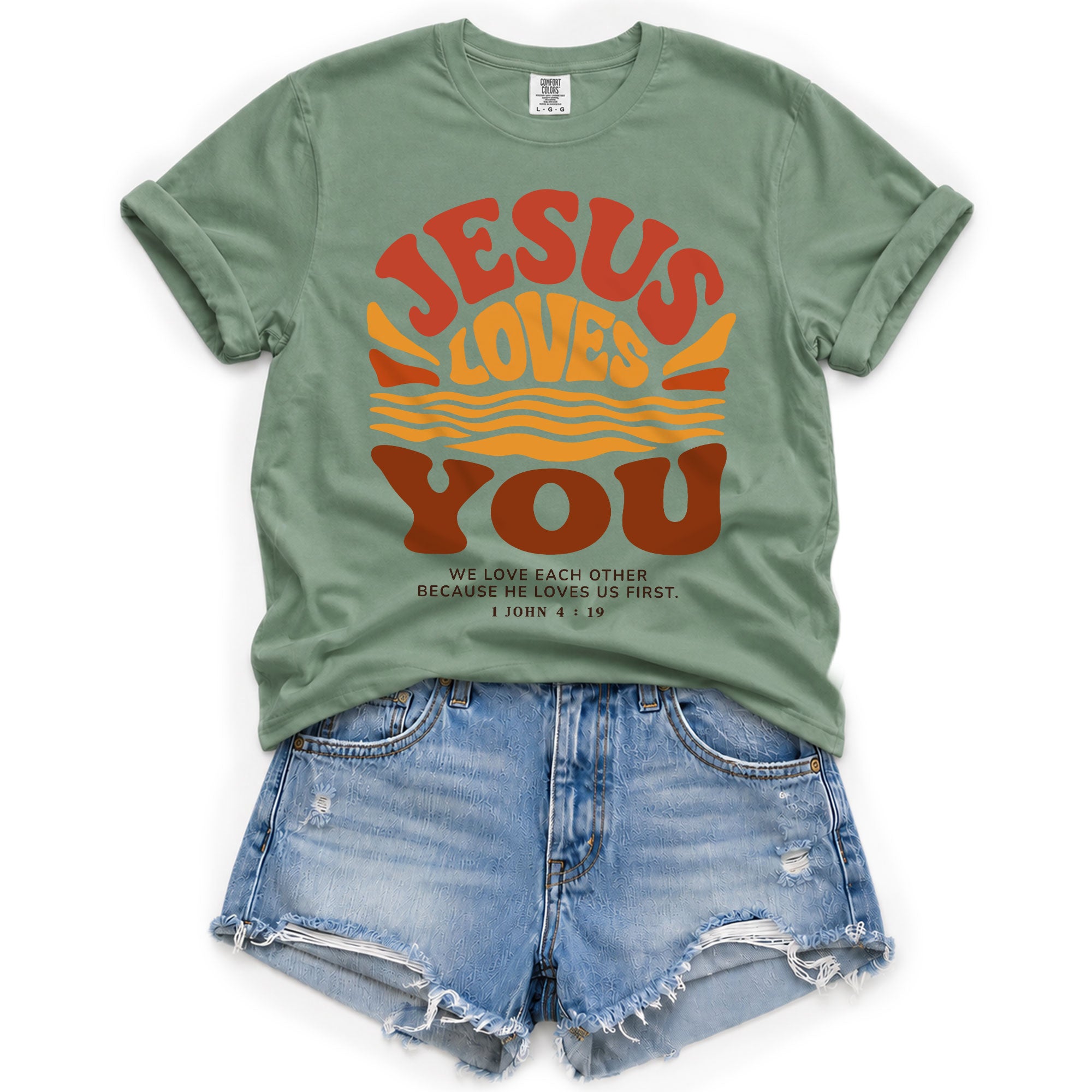 Jesus Loves You Shirt Sunset Wavy 70s Christian Bible Verse 1 John 4 19 Graphic Tee