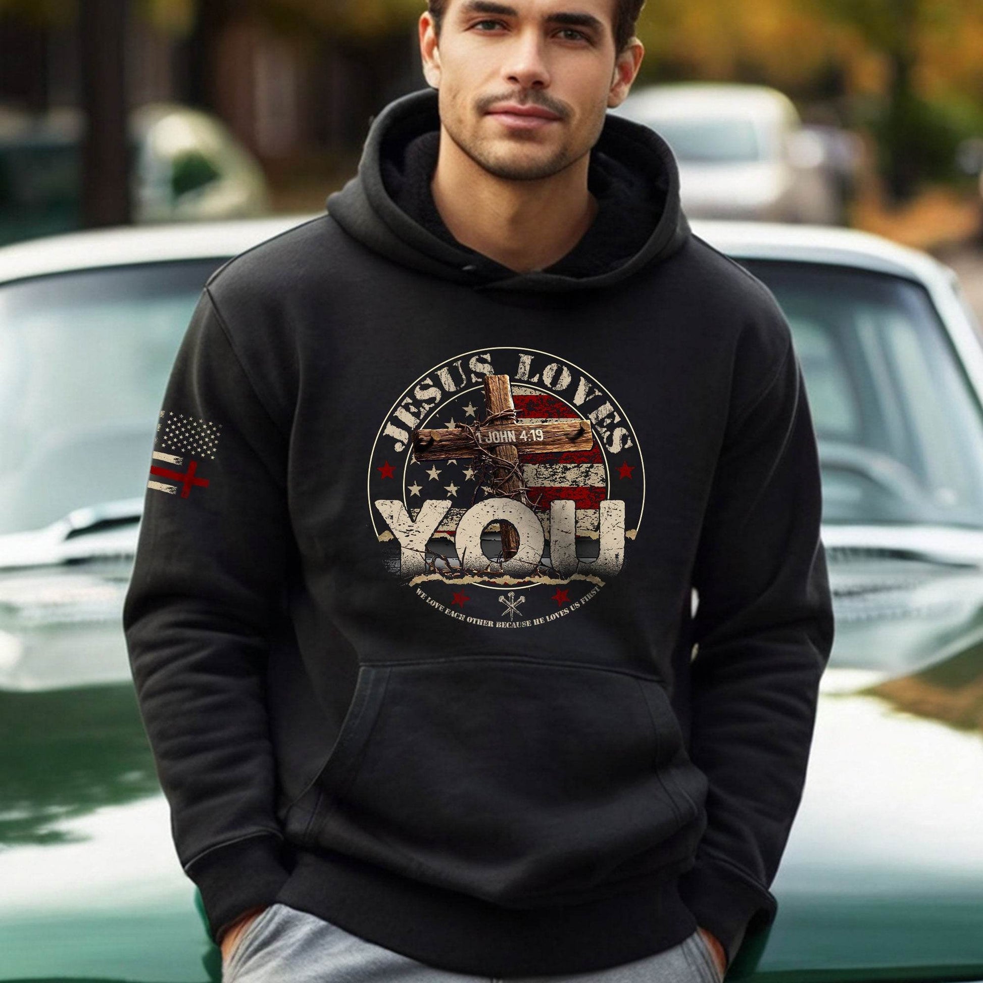 Jesus Loves You Hoodie – 1 John 4:19 Cross & American Flag - Rust Field Wear